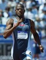 Calvin Harrison in action during the men's 400 meter qualifying dash at the U.S. Olympic track and field trials in Sacramento in this July 11, 2004 photo.